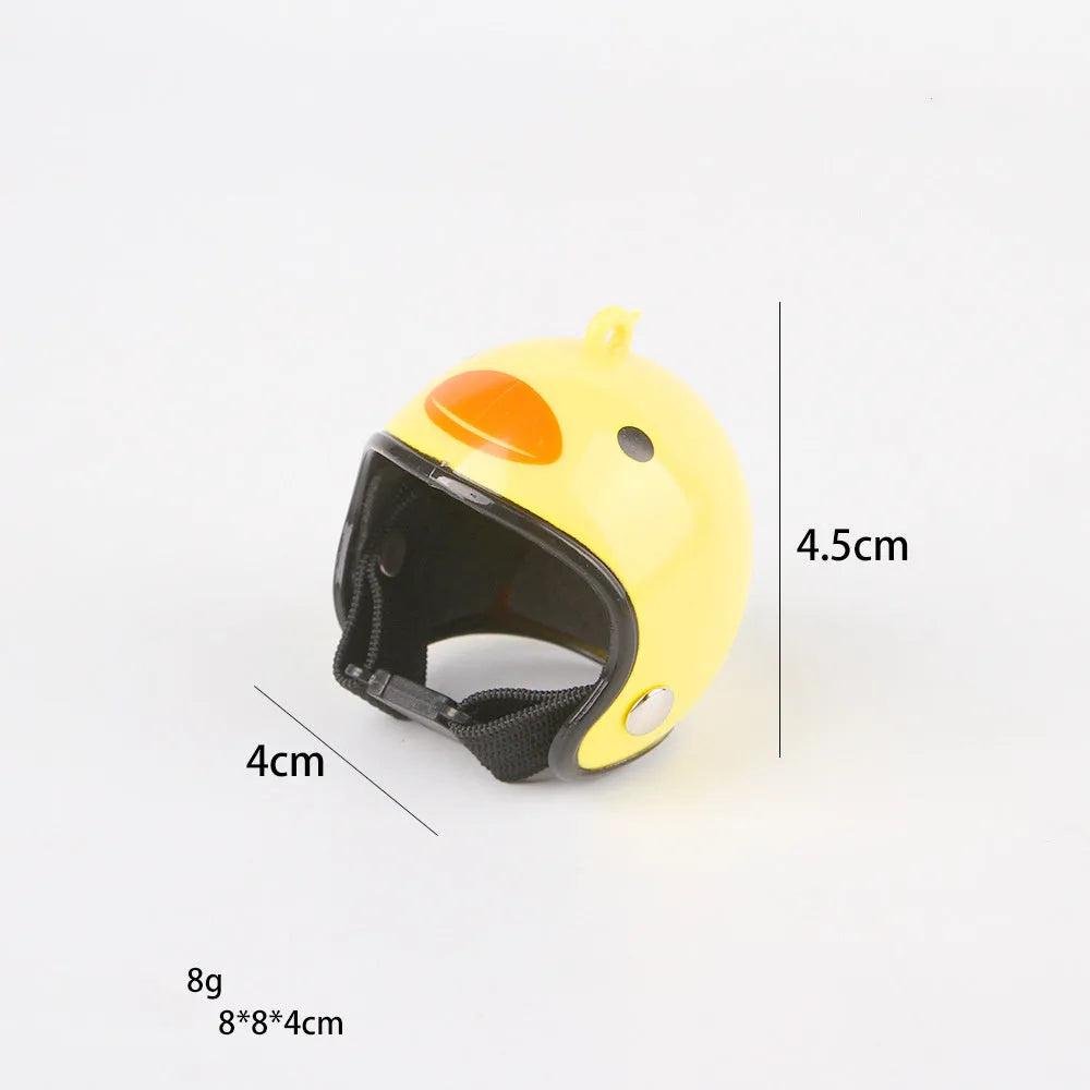 Adjustable hard plastic chicken helmet with sponge lining, elastic bands, and colourful options for small birds and poultry.