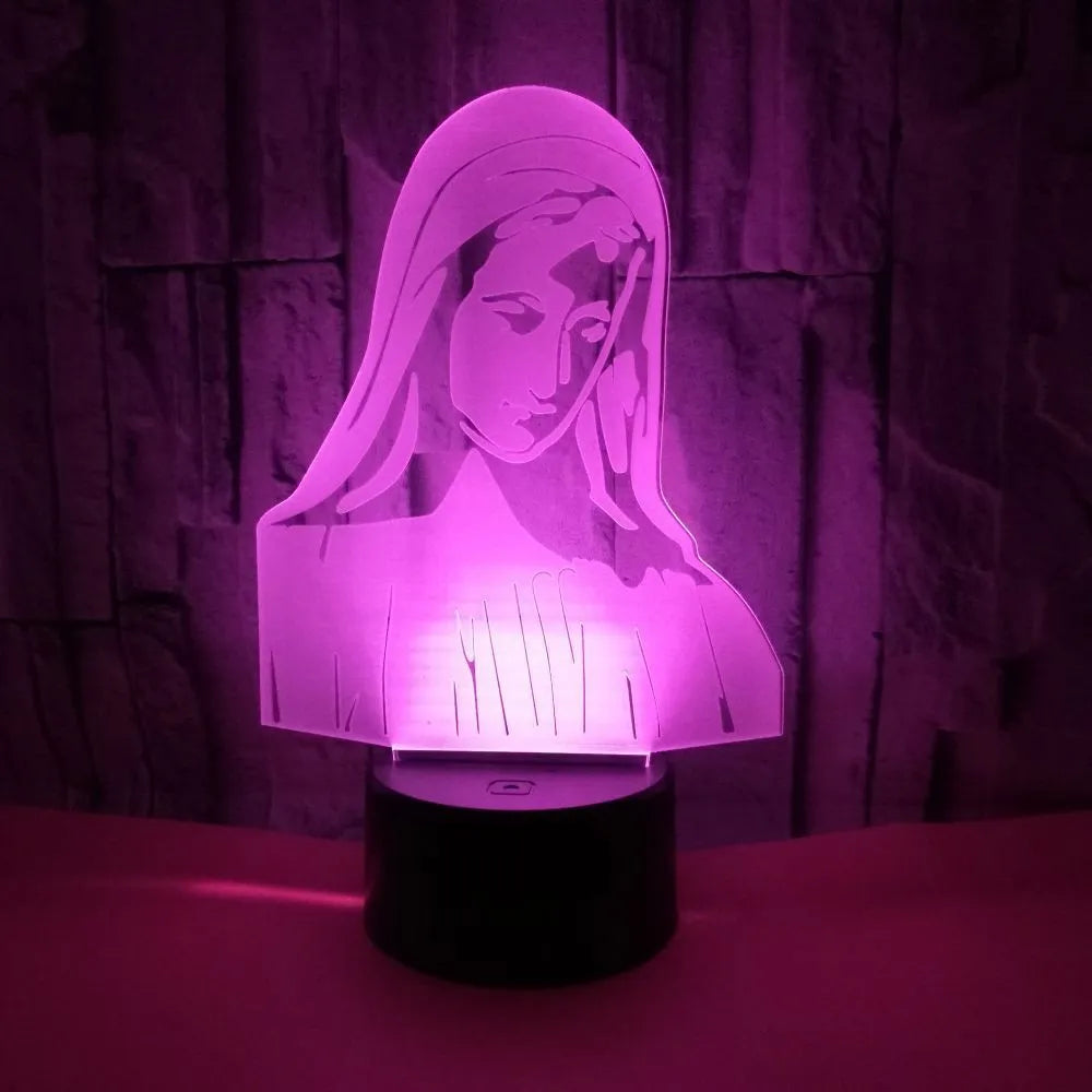3D LED kids night light with colourful ring pattern, USB cable, and touch-sensitive base on a table.