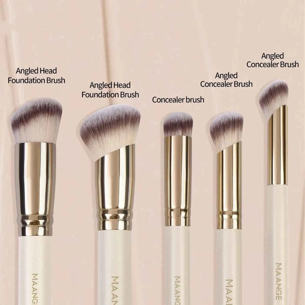 Five angled makeup brushes with apricot handles for powder, foundation and blush application