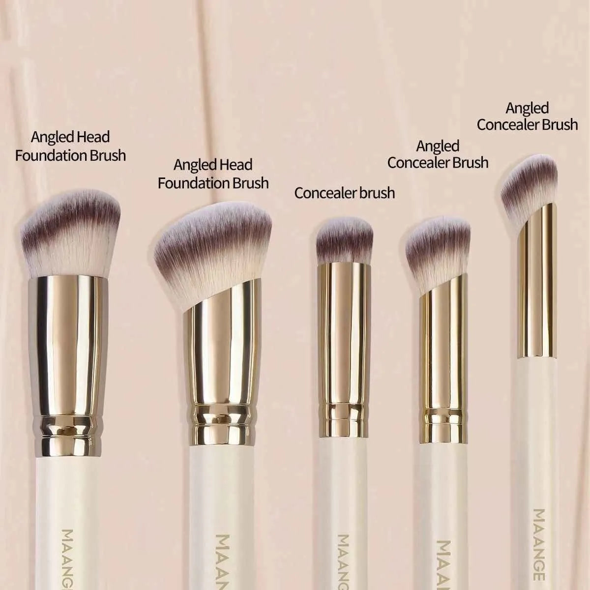 Five angled makeup brushes with apricot handles for powder, foundation and blush application