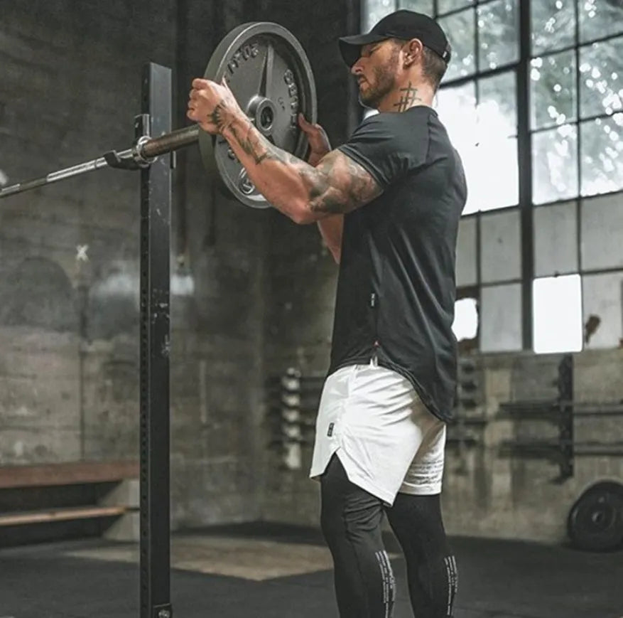 Plain short-sleeved mens gym shirt in green, showing cotton-spandex fabric texture.