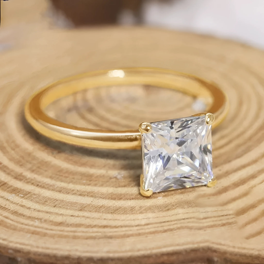 Women's simple geometric sterling silver ring with round zirconium stone in silver, gold, or rose gold colour.