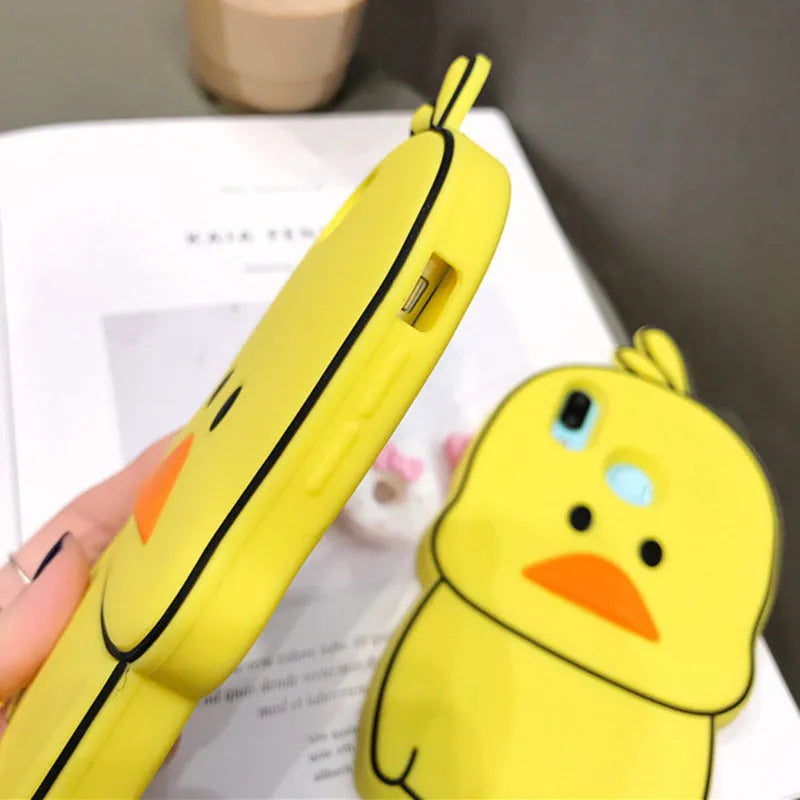 Green and yellow cartoon animal silicone back cover case for Apple iPhone models.