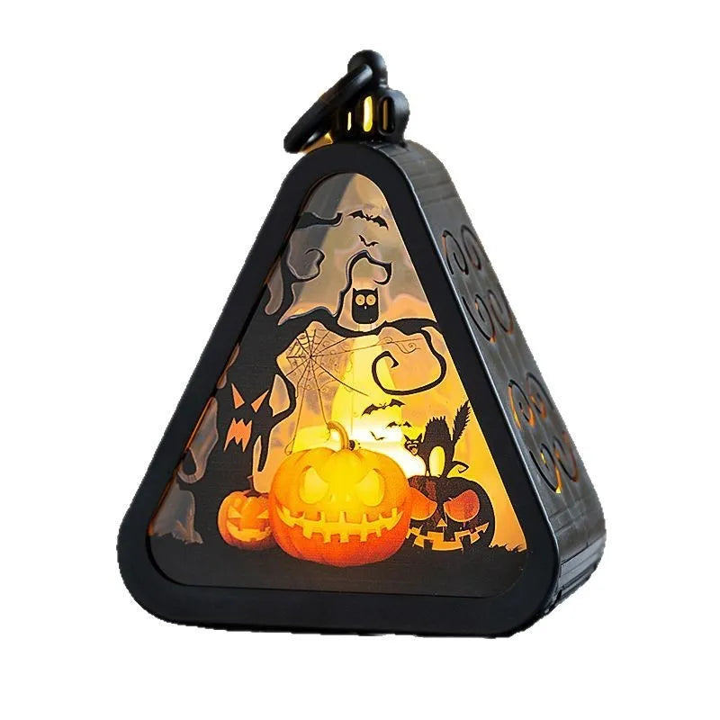 Halloween pumpkin lamp decoration in plastic and glass measuring 8.9cm by 5.2cm by 11.5cm