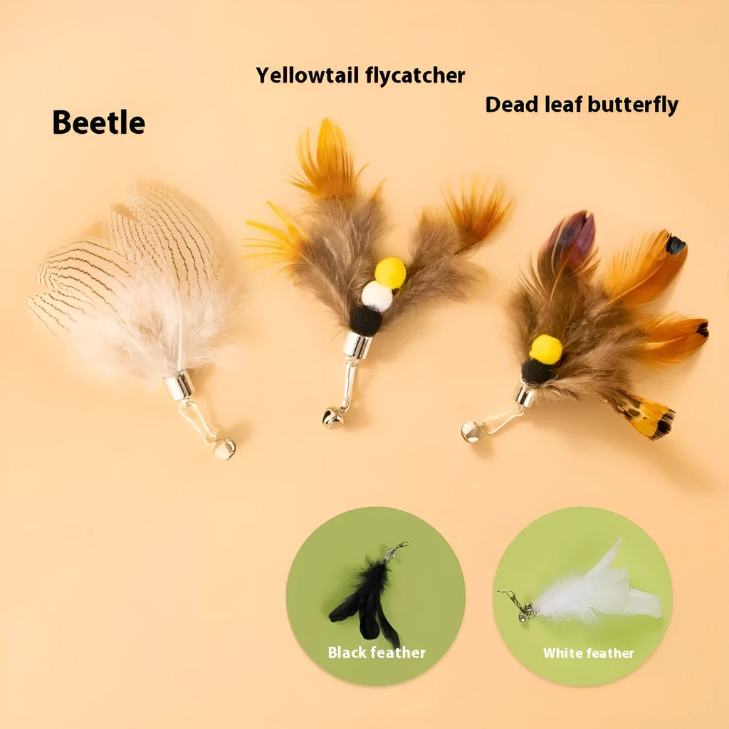 Three steel wire cat toy replacement heads with small flying insect designs on a white background