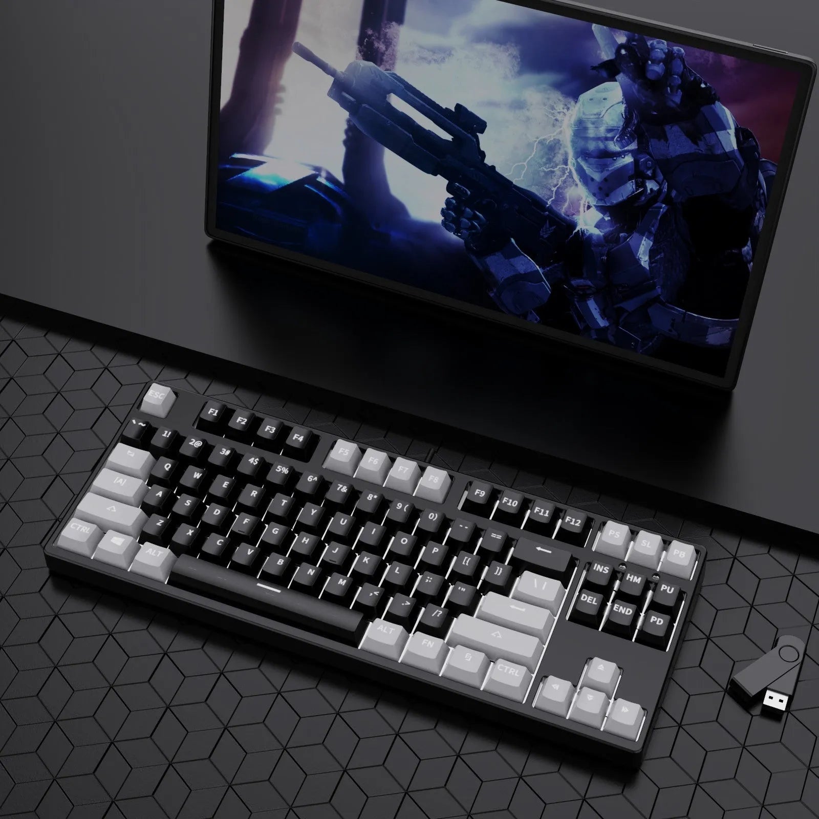 87-key wired mechanical gaming keyboard with colourful keycaps on a metal frame, shown with key puller and cable.