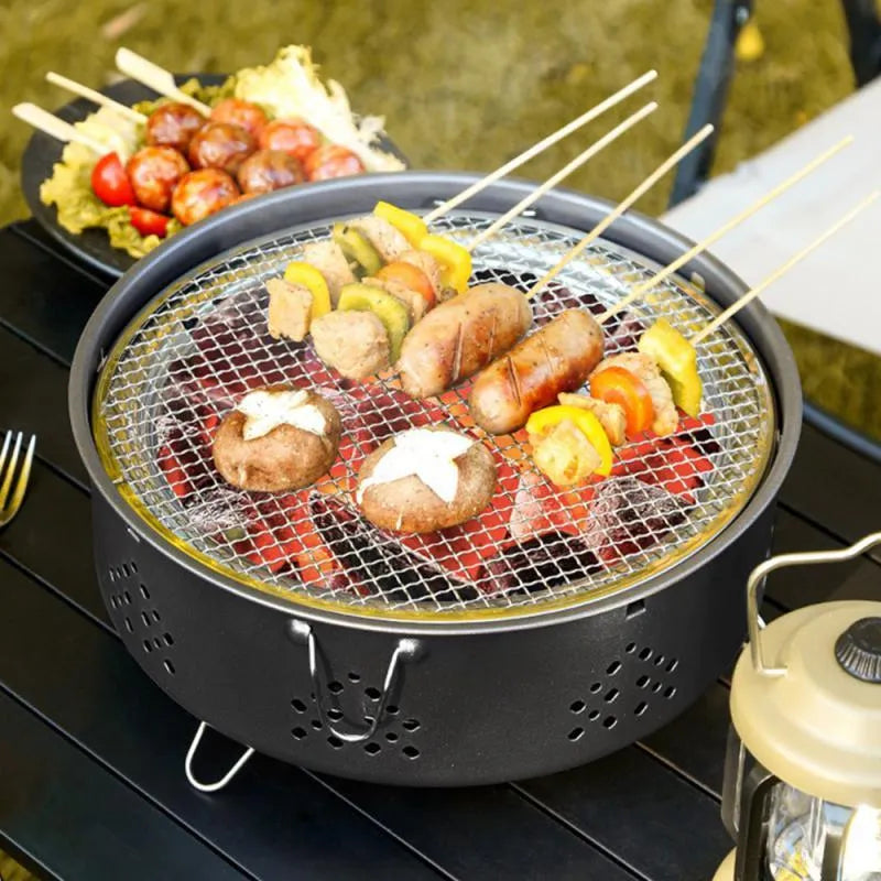 Portable stainless steel charcoal barbecue grill with detachable parts and storage bag for outdoor use