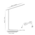 White plastic bedside lamp with touch controls and USB charging port