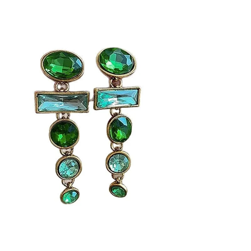A pair of retro green gradient tassel earrings with inlaid zircon stones in a Chinese geometric style.