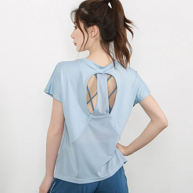 Women's short sleeve polyester sports t-shirt in pink, available in sizes S to XL