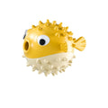 Yellow fish-shaped vinyl dog chew toy with textured surface and squeaker for aggressive chewers