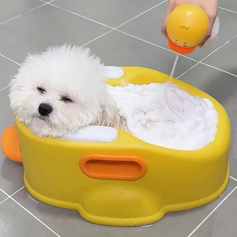 Blue duck-shaped PVC bathtub for washing a small dog or cat.