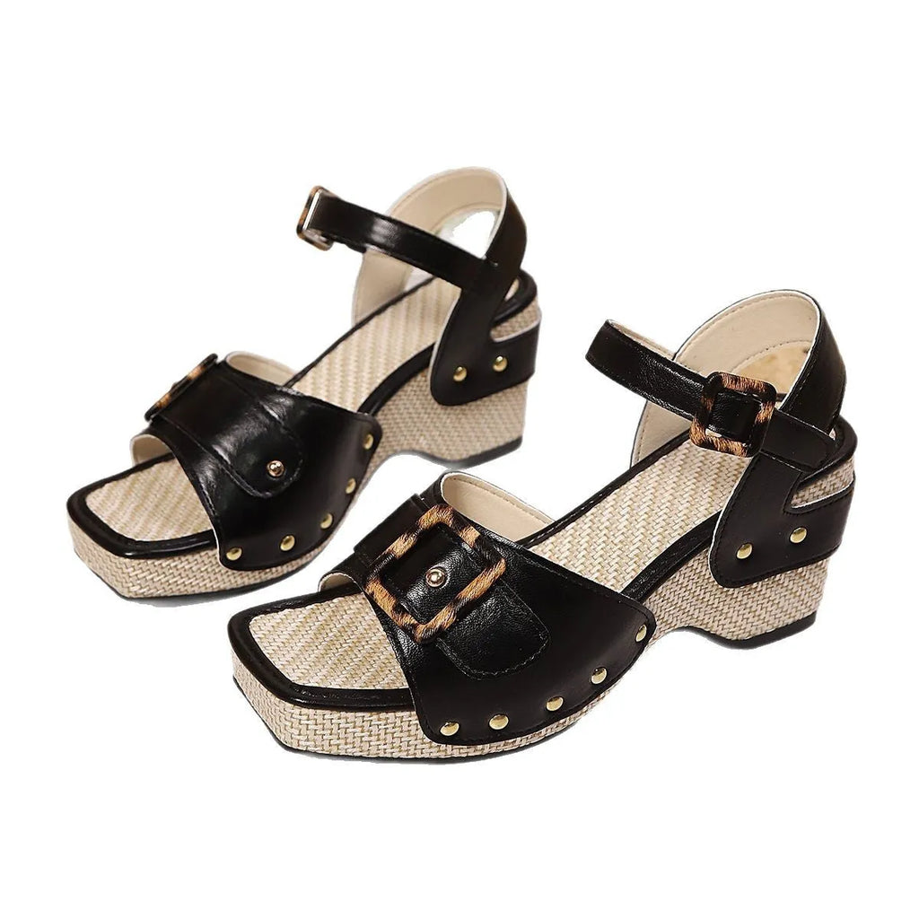 Pair of female button metal buckle beach chunky heel sandals in black with square toe and rubber sole