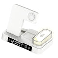 4-in-1 wireless charger station with alarm clock display and foldable stand charging a phone, headphones and watch