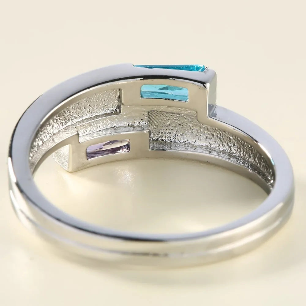 Silver electroplated copper ring with zircon stone setting showing ins style design