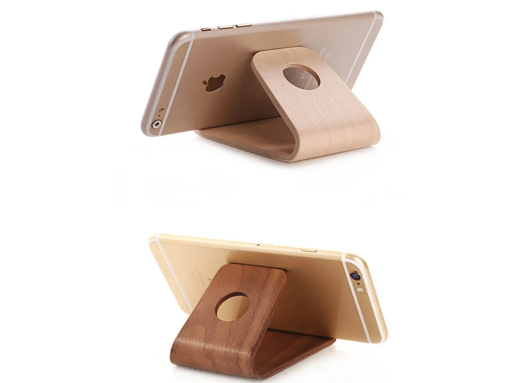 Wooden stand compatible with Apple iPhone in Walnut and White Maple finish on desk