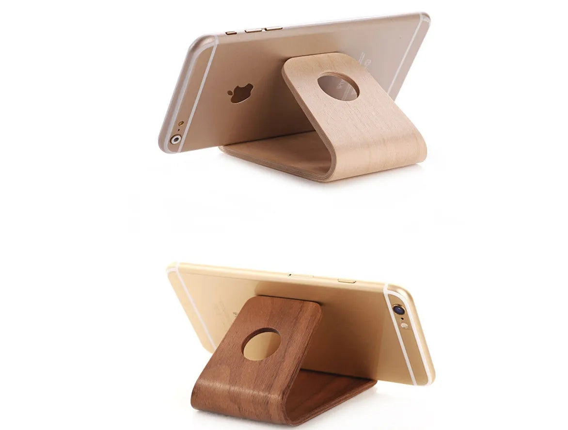 Wooden stand compatible with Apple iPhone in Walnut and White Maple finish on desk