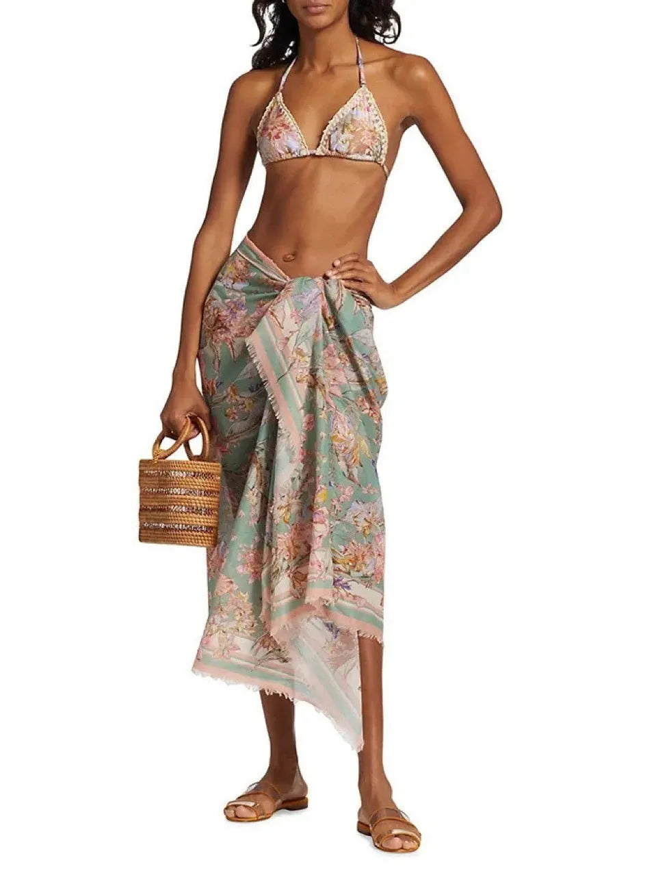 Women's creamy white floral bikini set with briefs and skirt on nylon fabric