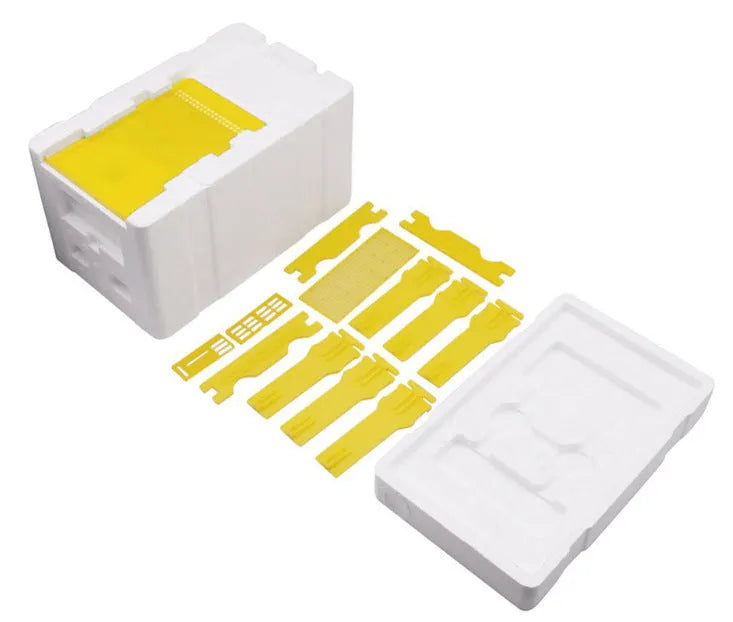 Three white EPS foam mini delivery boxes for beehive queen introduction and bee breeding.