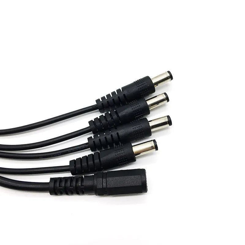 Black DC 1-to-4 monitoring power cord with copper core, 0.39m length, 5.5mm connectors for CCTV cameras