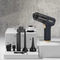 Black wireless handheld vacuum cleaner with nozzle attachments for car and home cleaning