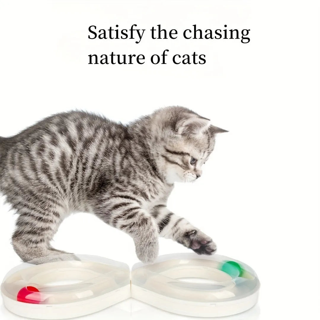 Blue and white cat toy set with a turntable track ball and a teasing stick on a floor.