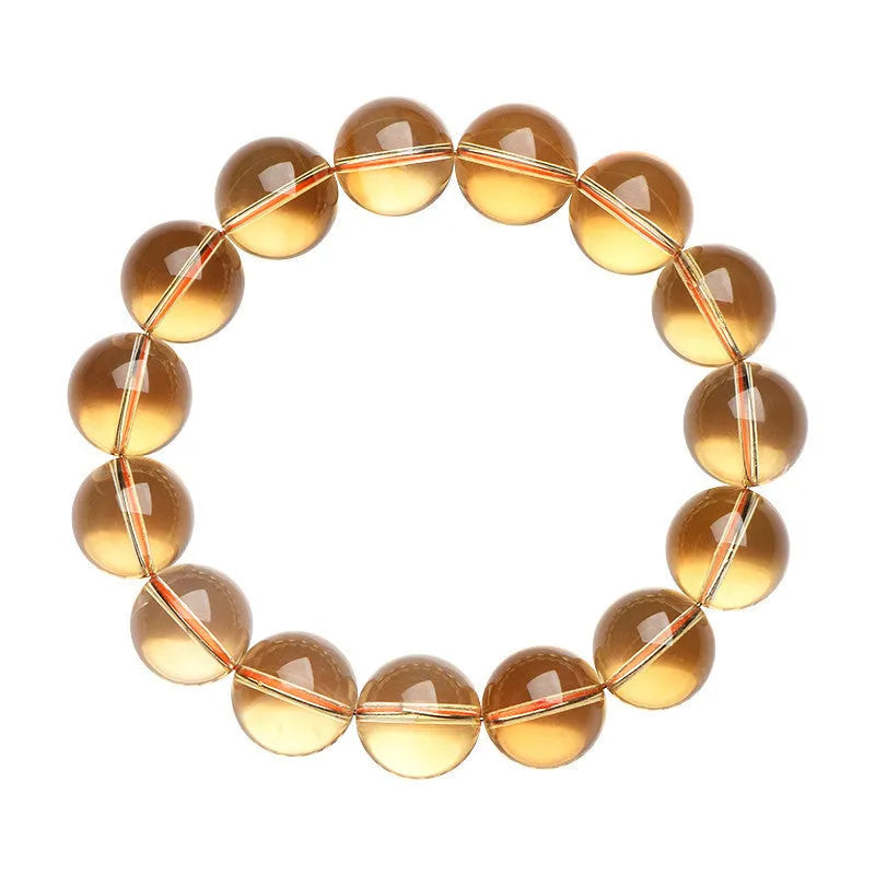 Natural citrine scattered beads ball bracelet in 7A and 6A colour grades on a white background.