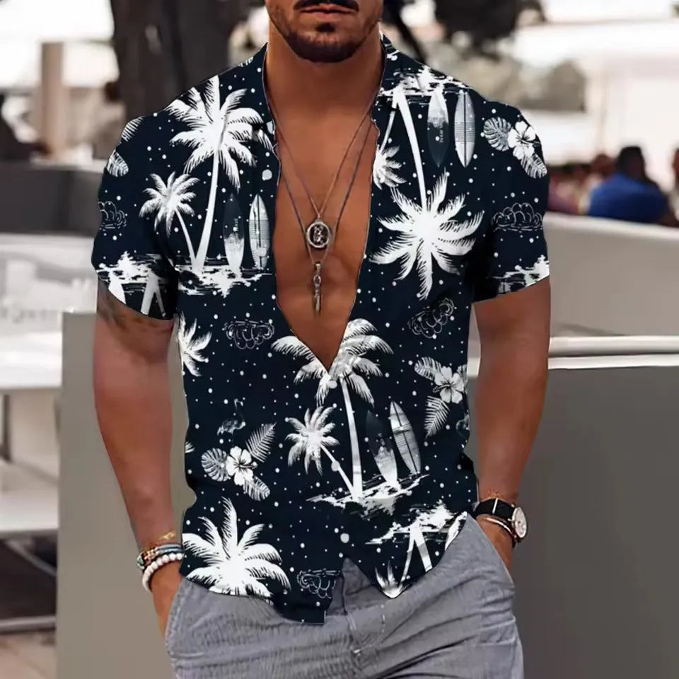 Man wearing a loose-fit short sleeve shirt with a colourful floral print pattern.