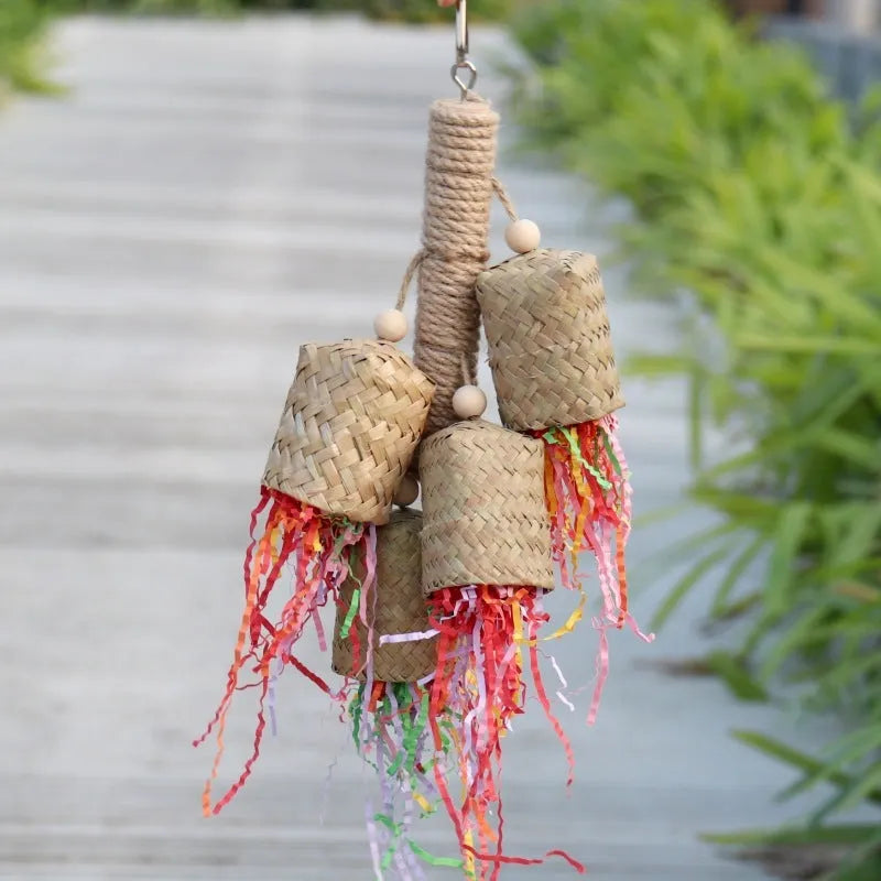 Colourful wooden parrot shredding toy with sisal fibre, measuring 15cm by 35cm.