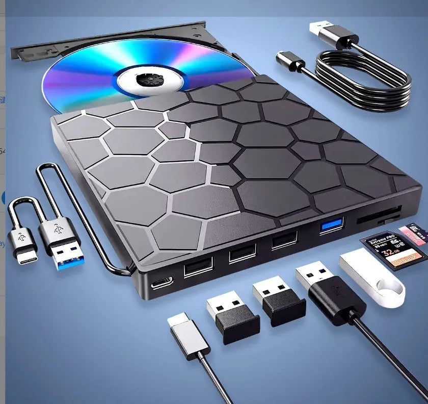 Black multifunctional external CD driver CD writer with USB cable on desk