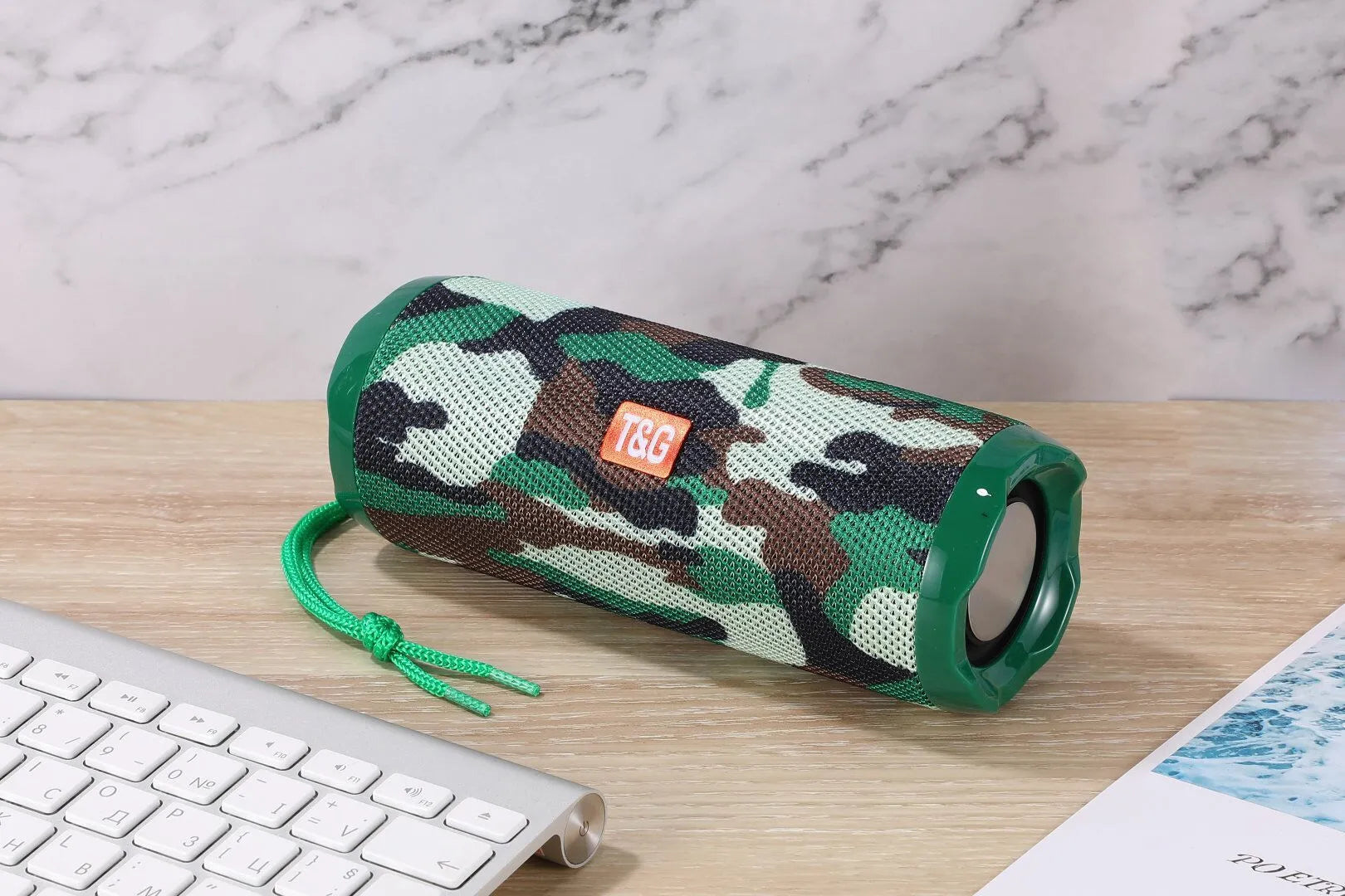 Portable Bluetooth speaker with card holder slot in multiple colour options including camouflage pattern