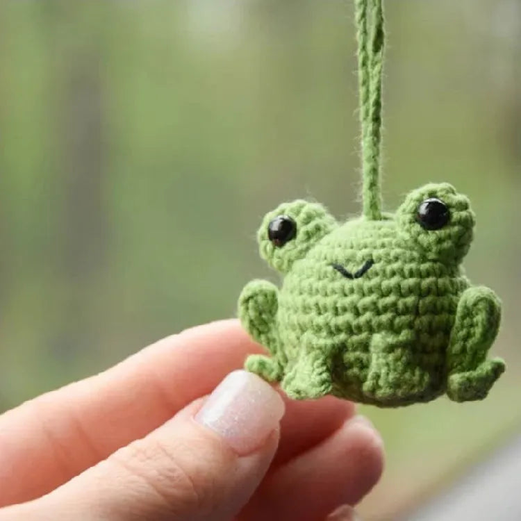 Green handmade plush woven frog car pendant hanging, showing its 15cm length and cartoon style.