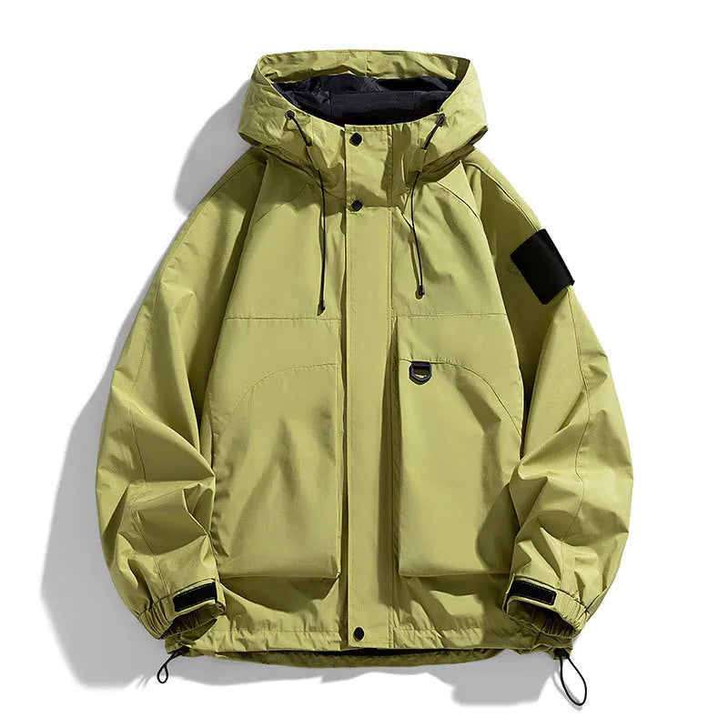 Men's black hooded waterproof windproof jacket with long sleeves, shown on a model.
