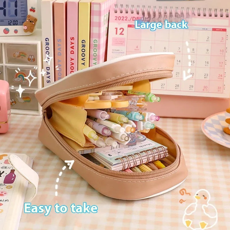 Transparent PVC pencil case with cartoon bear design showing pens inside
