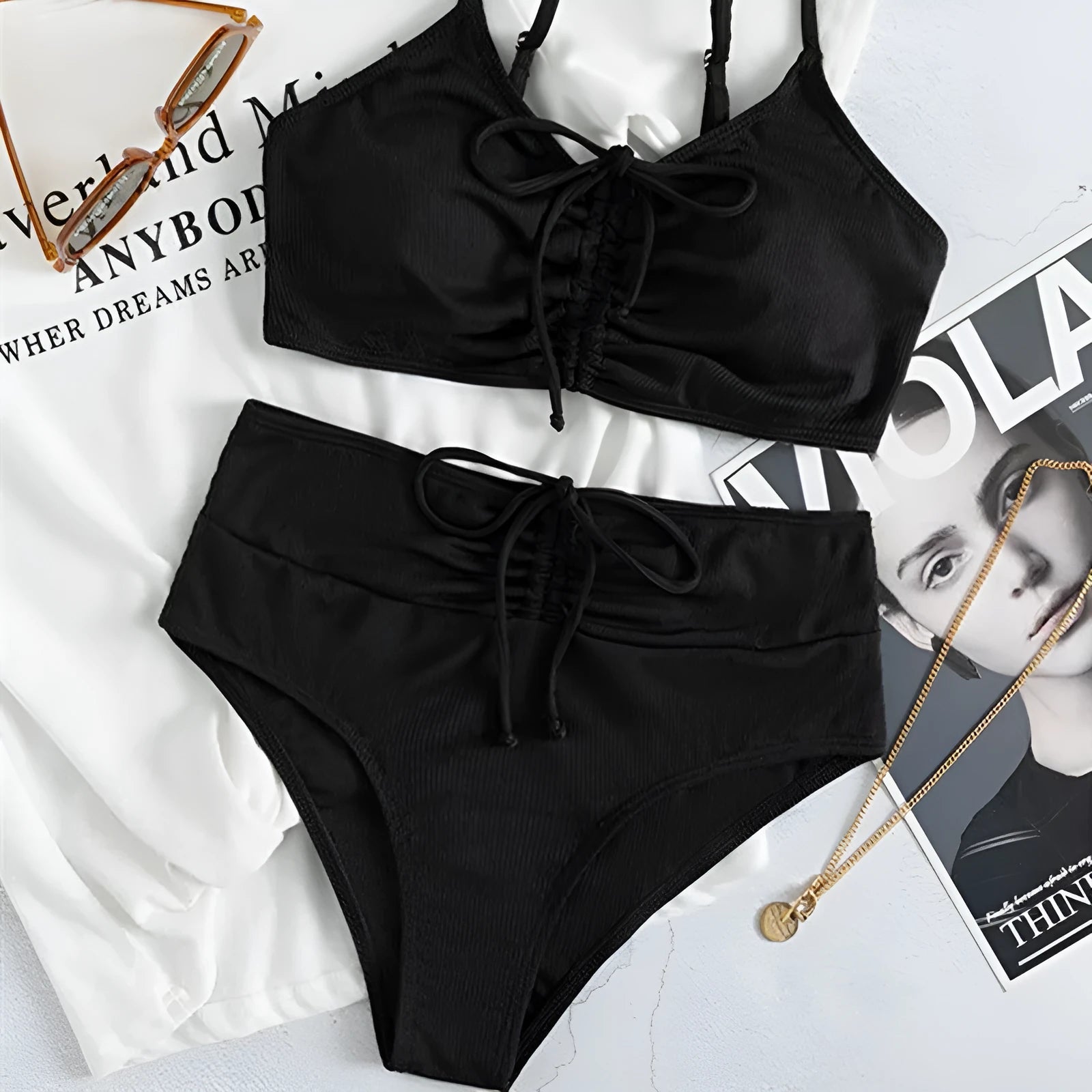 Women's black nylon sling split high waist bikini swimsuit set with top and shorts