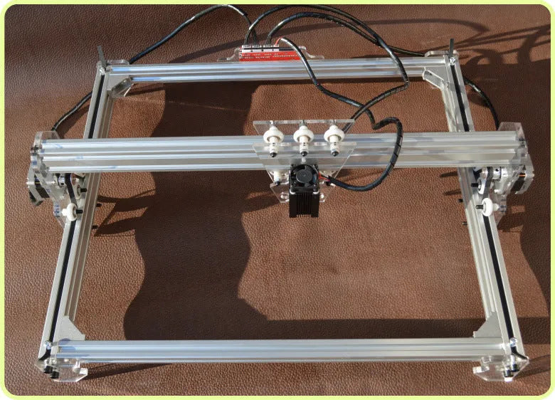 Miniature laser engraving machine with 3000mw laser and 400x300mm bottom plate for marking and lettering