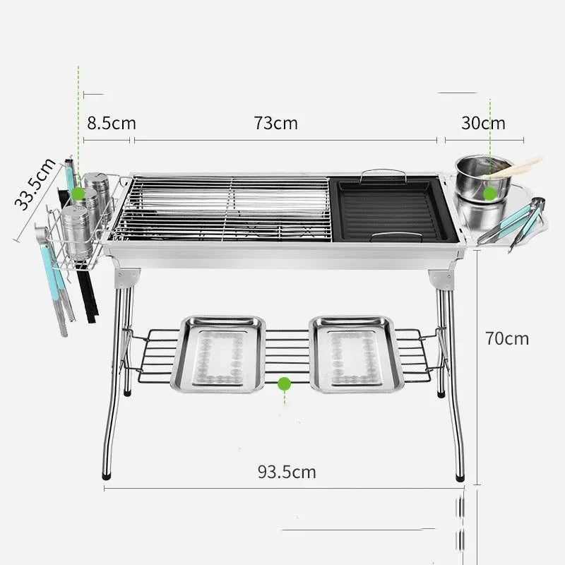 Stainless steel portable folding barbecue oven with large grill, shown outdoors.