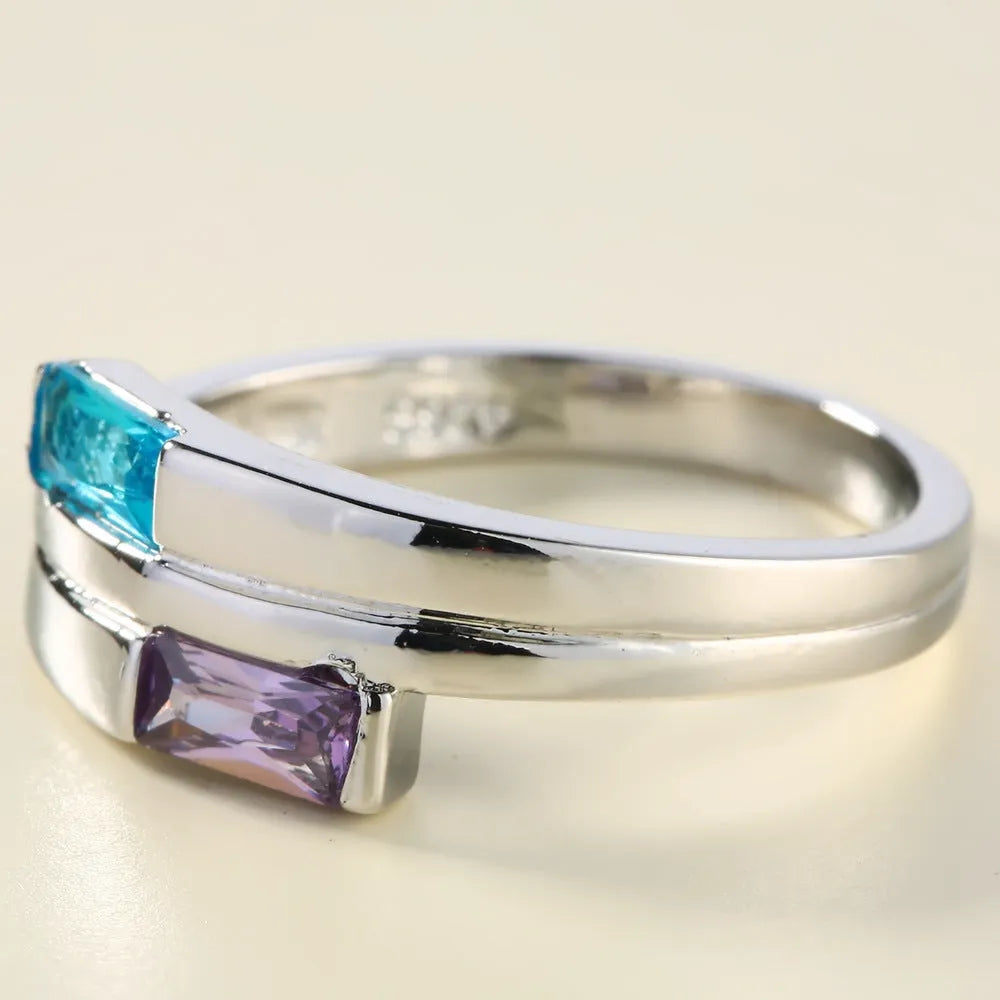 Silver electroplated copper ring with zircon stone setting showing ins style design