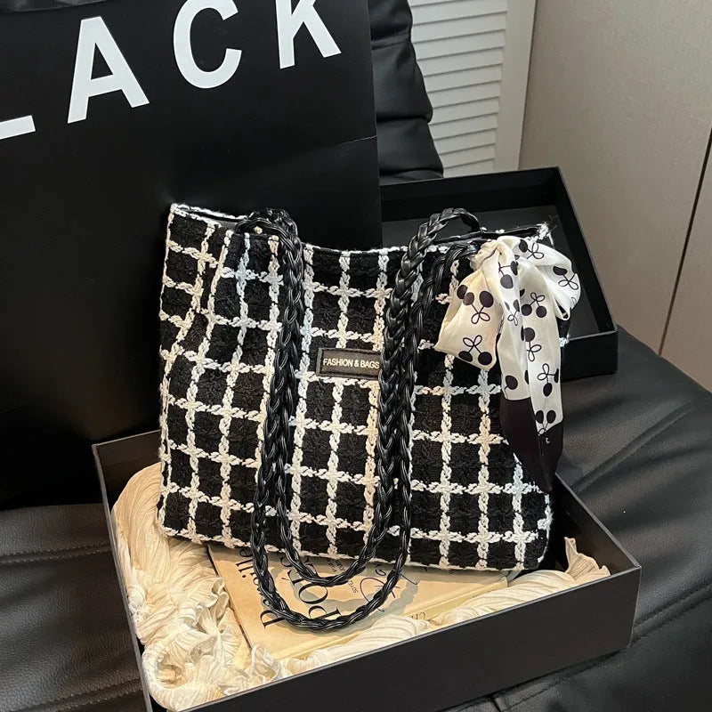 Woolen shoulder bag in black with horizontal square shape and sandwich pocket for commuting and shopping use