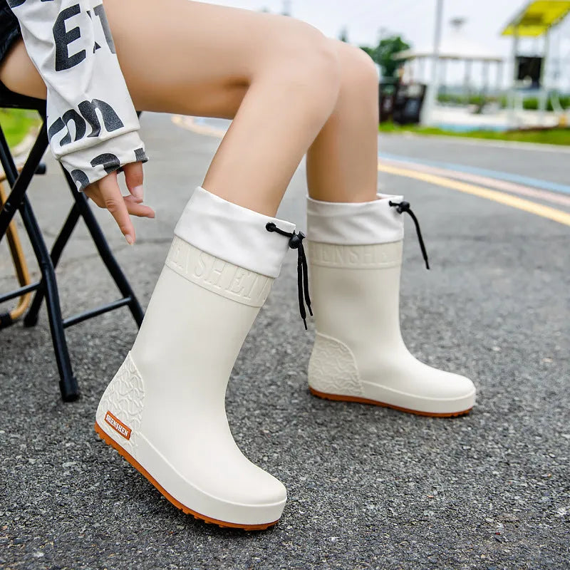 Women's non-slip wear-resistant rain boots in solid colour with PVC upper, available in apricot