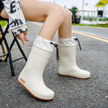 Women's non-slip wear-resistant rain boots in solid colour with PVC upper, available in apricot