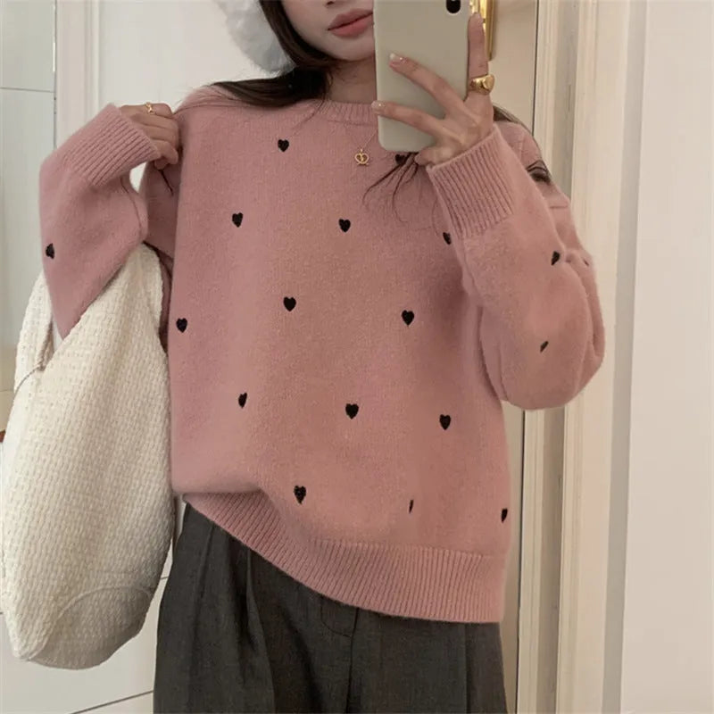 Women's loose fit acrylic pullover sweater with crew neck and embroidery details