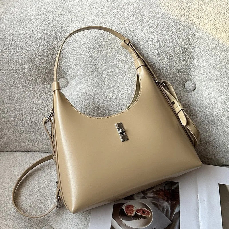 Women's dumpling-shaped crossbody shoulder bag in genuine cowhide leather with sandwich pocket and internal organisers
