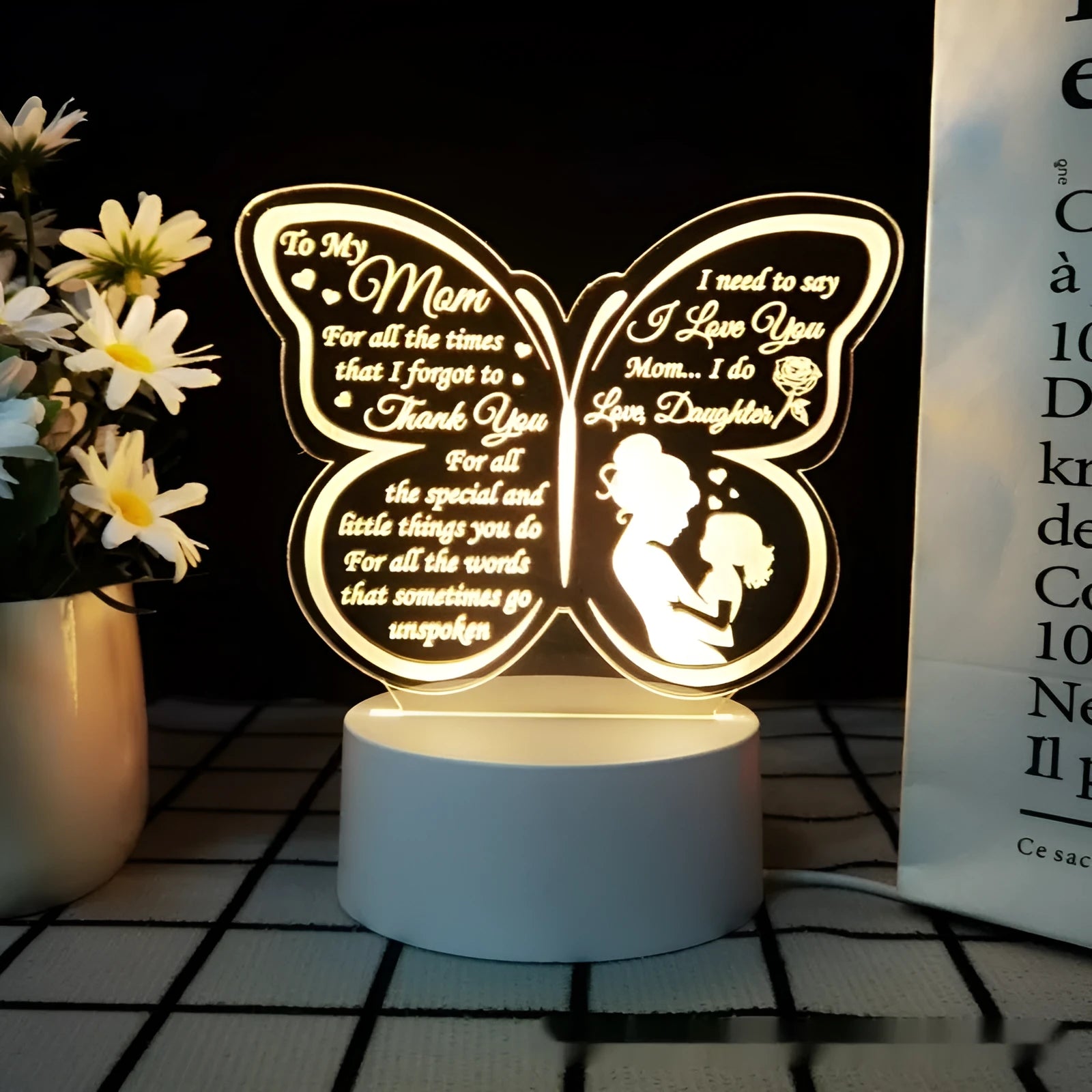 Heart-shaped table lamp with acrylic shade on a desk, glowing warm light, 160mm size, touch switch visible.