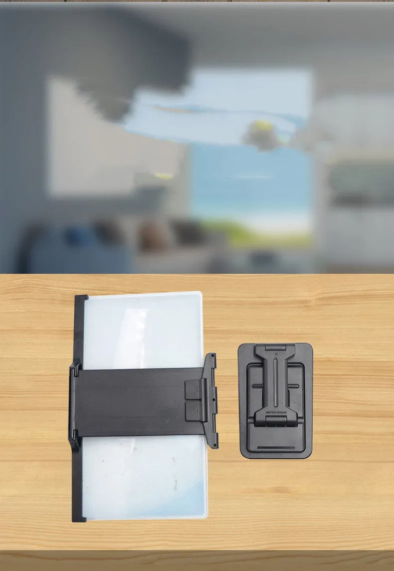 Black folding mobile phone screen amplifier with detachable holder showing 12-inch curved magnifier