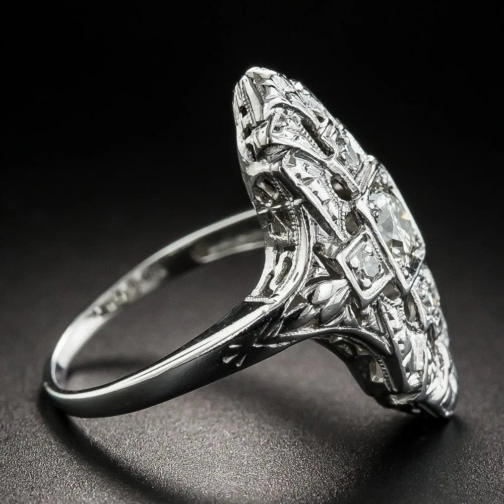 Geometric hollow-out copper ring with silver electroplated finish and diamond stud accents