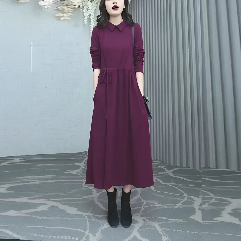 Purplish red plus size women's dress with extra long sleeves and a long skirt for autumn and winter office wear.