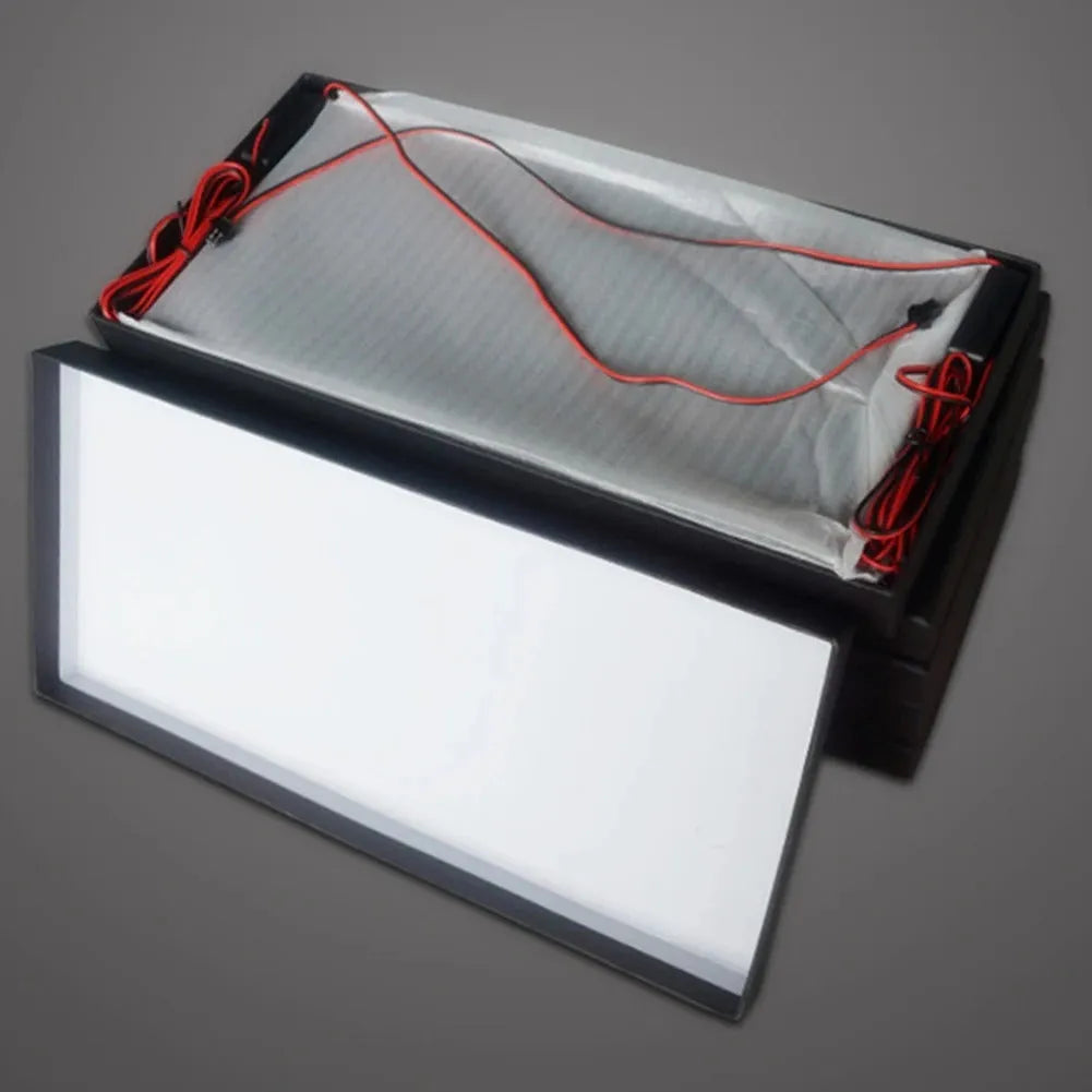 Two plastic LED light bars for truck licence plate illumination, showing uniform soft white light.