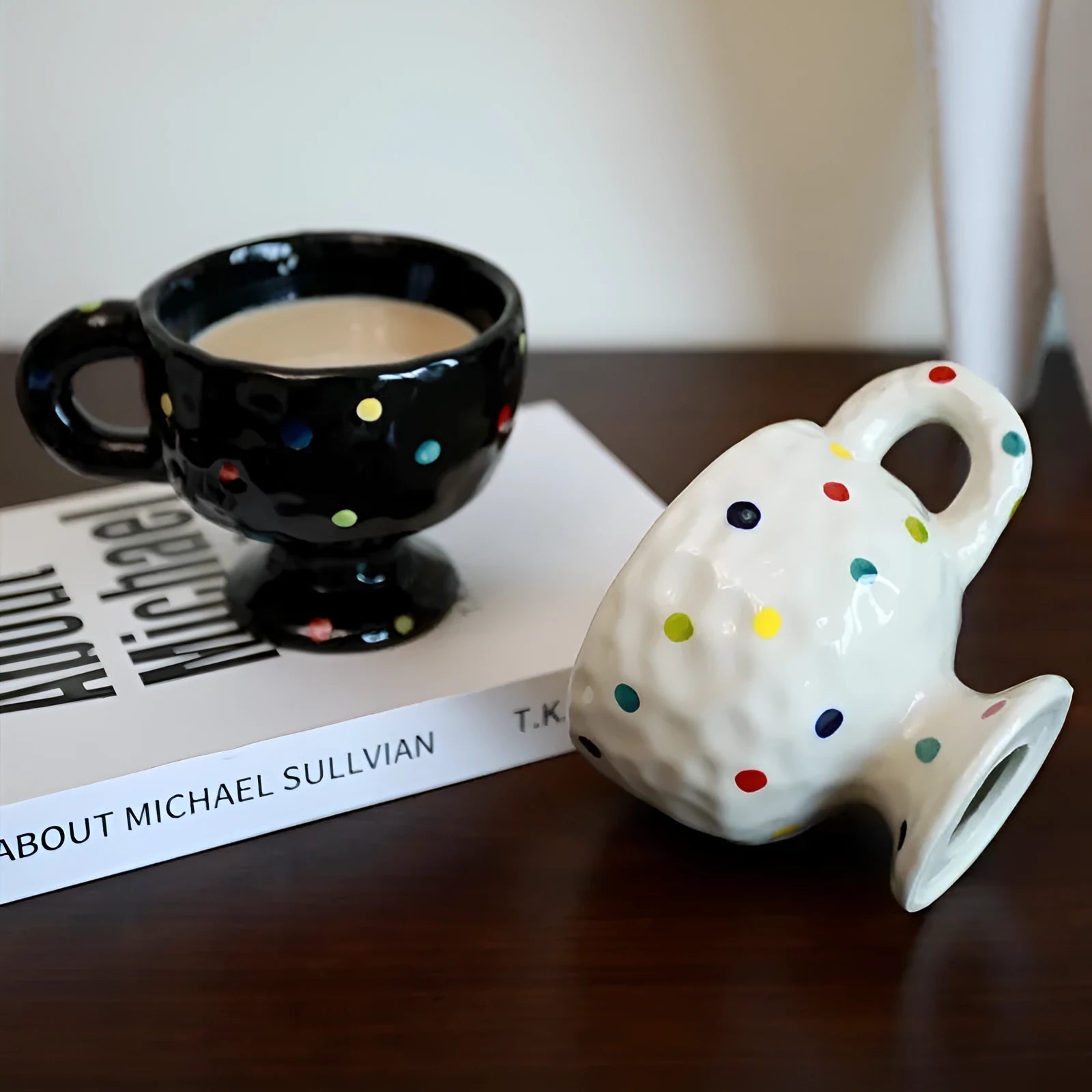 Hand-pinched irregular shaped ceramic mug in solid colour, 250ml capacity