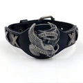 Black geometric leather bracelet with alloy eagle watch-button closure showing varying width from 1.7cm to 3.8cm